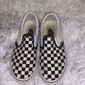 Black and white checkered vans.